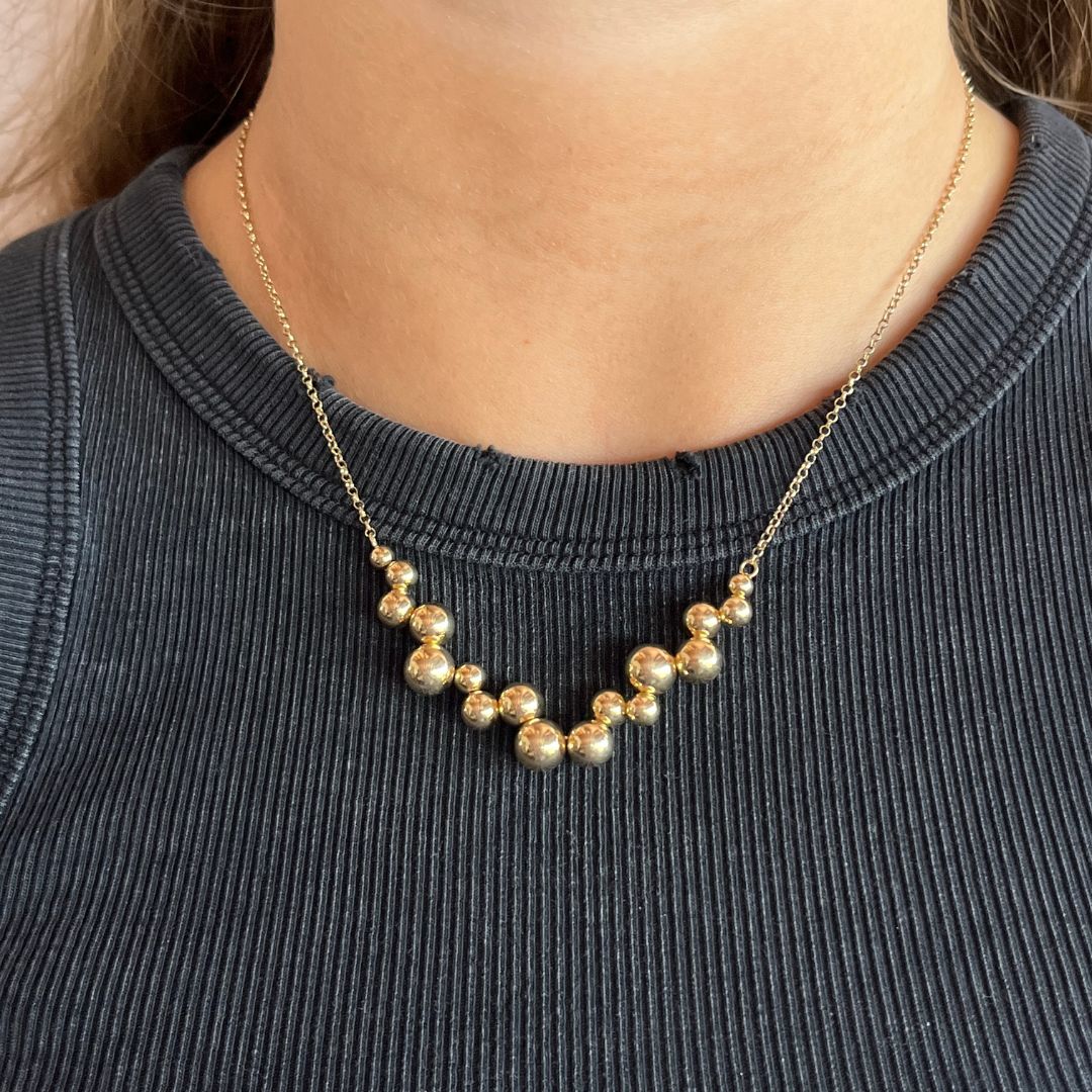 gold balls necklace